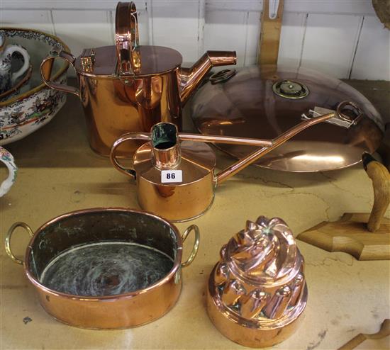 Two copper watering cans, bedwarmer, jelly mould etc